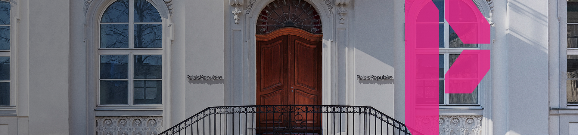 Staricase of PalaisPopulaire with pink letter P designed in the picture